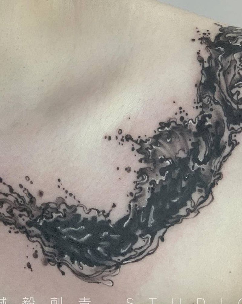 墨水浪纹身图片_手臂胸部水墨水彩纹身图案