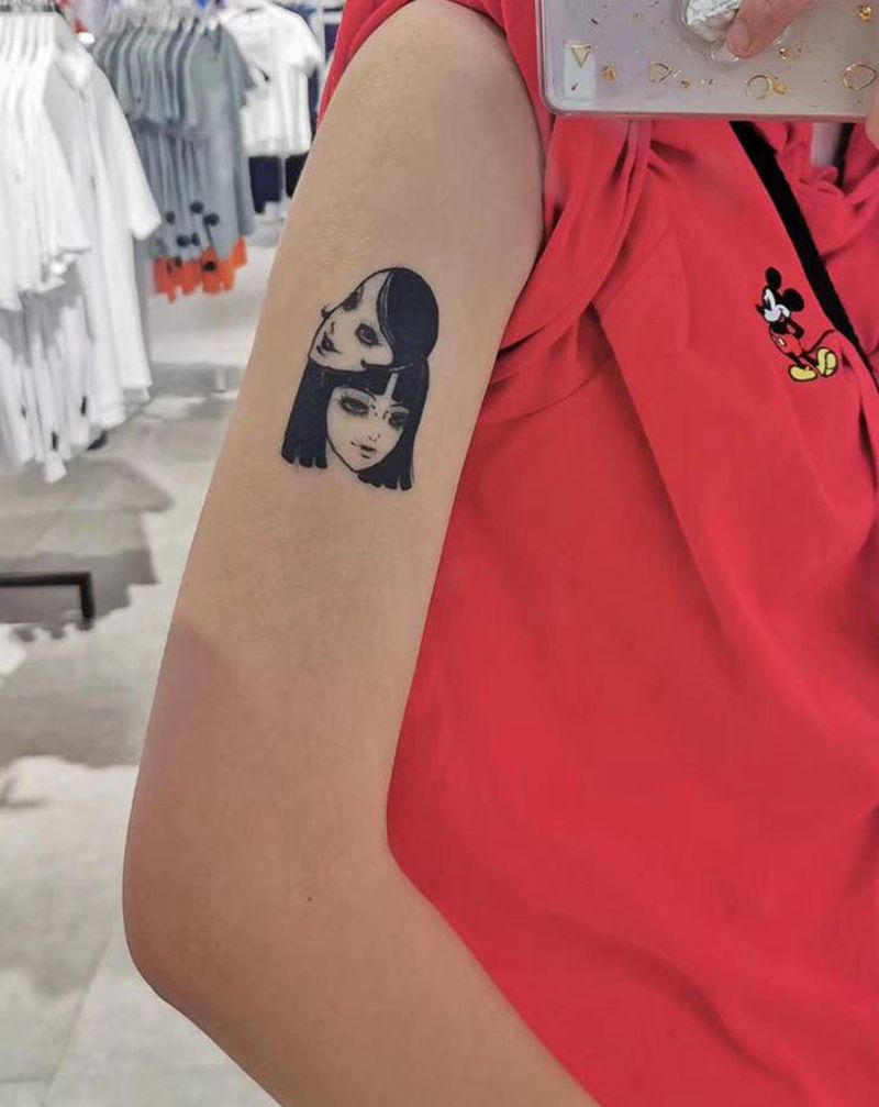 遮盖猫纹身图片_手臂纹身图案