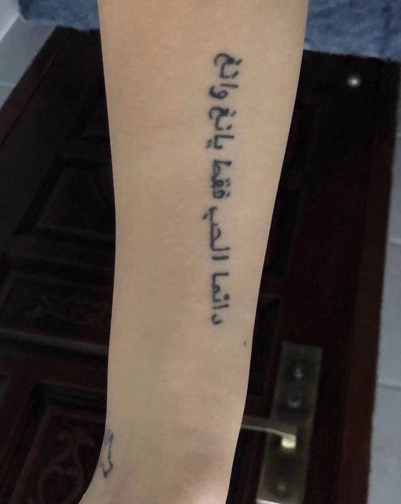 遮盖纹身图片_手臂水墨纹身图案