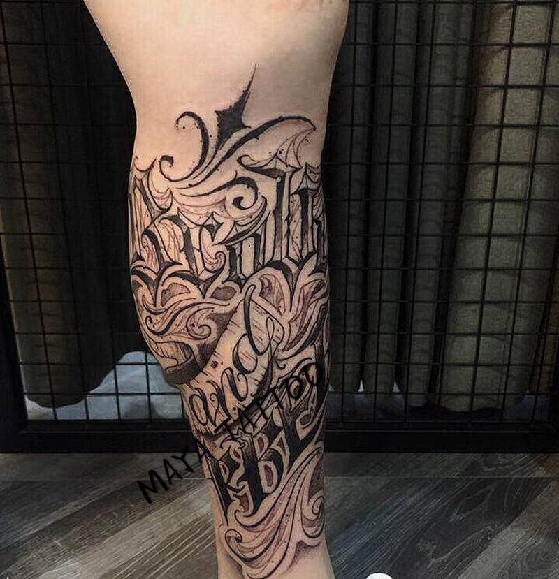 花体字纹身图片_腿部纹身图案