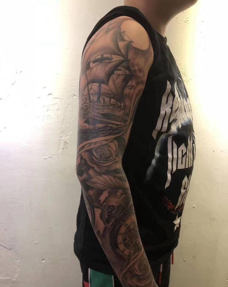 卡姿兰大眼纹身图片_手臂纹身图案