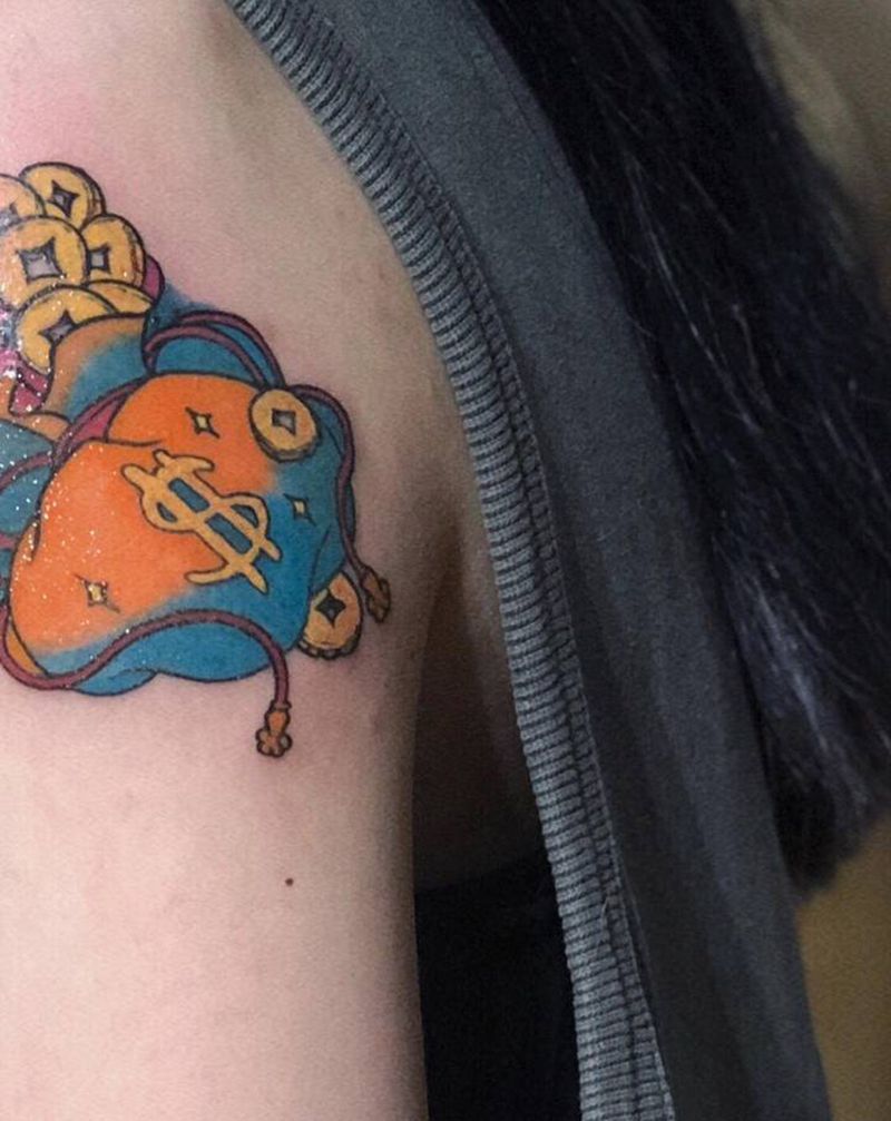 钱袋纹身图片_手部手臂水彩纹身图案