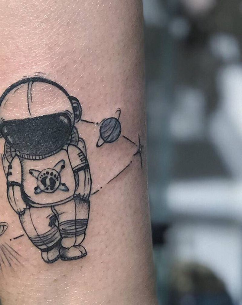 宇航员纹身图片_腿部脚部几何点刺荧光星球纹身图案