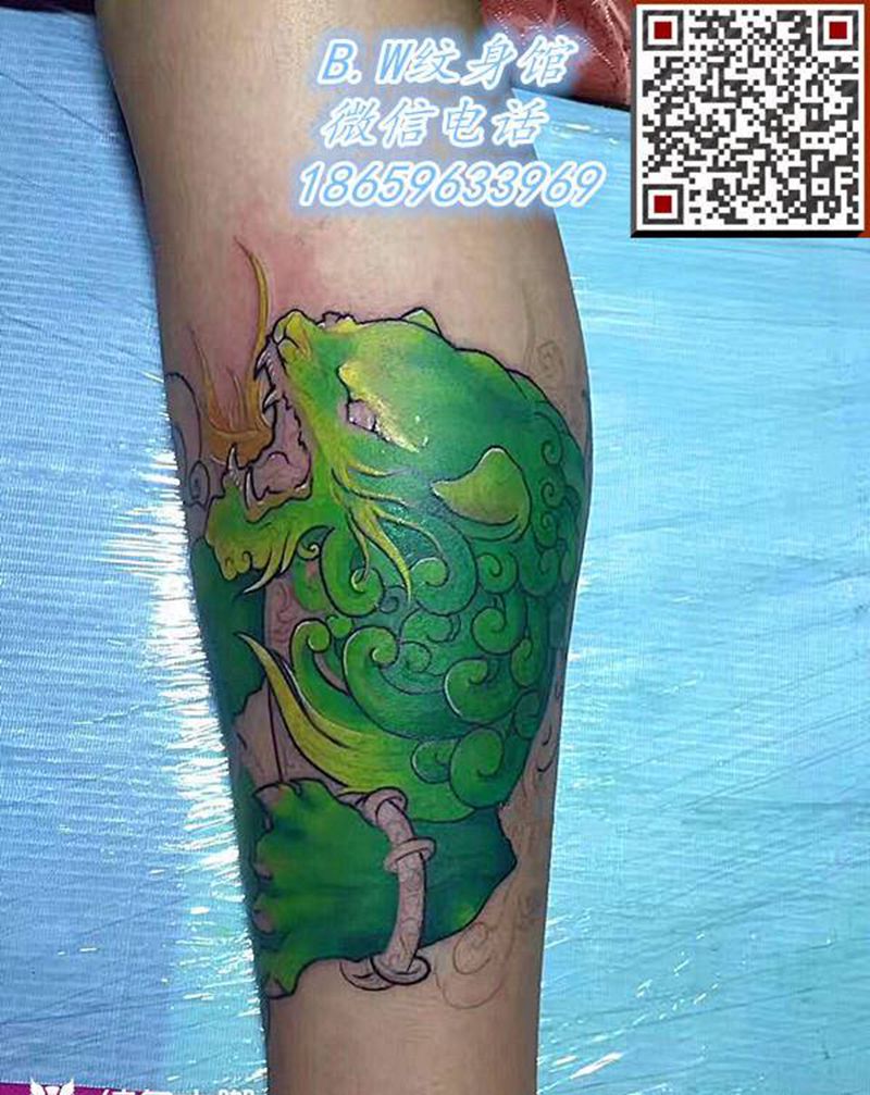唐狮纹身图片_腿部新传统纹身图案