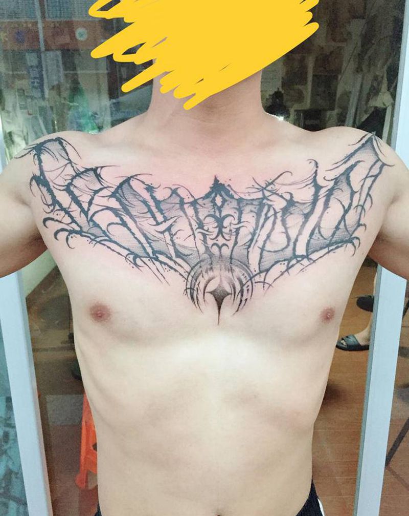 无体字纹身图片_胸部点刺纹身图案