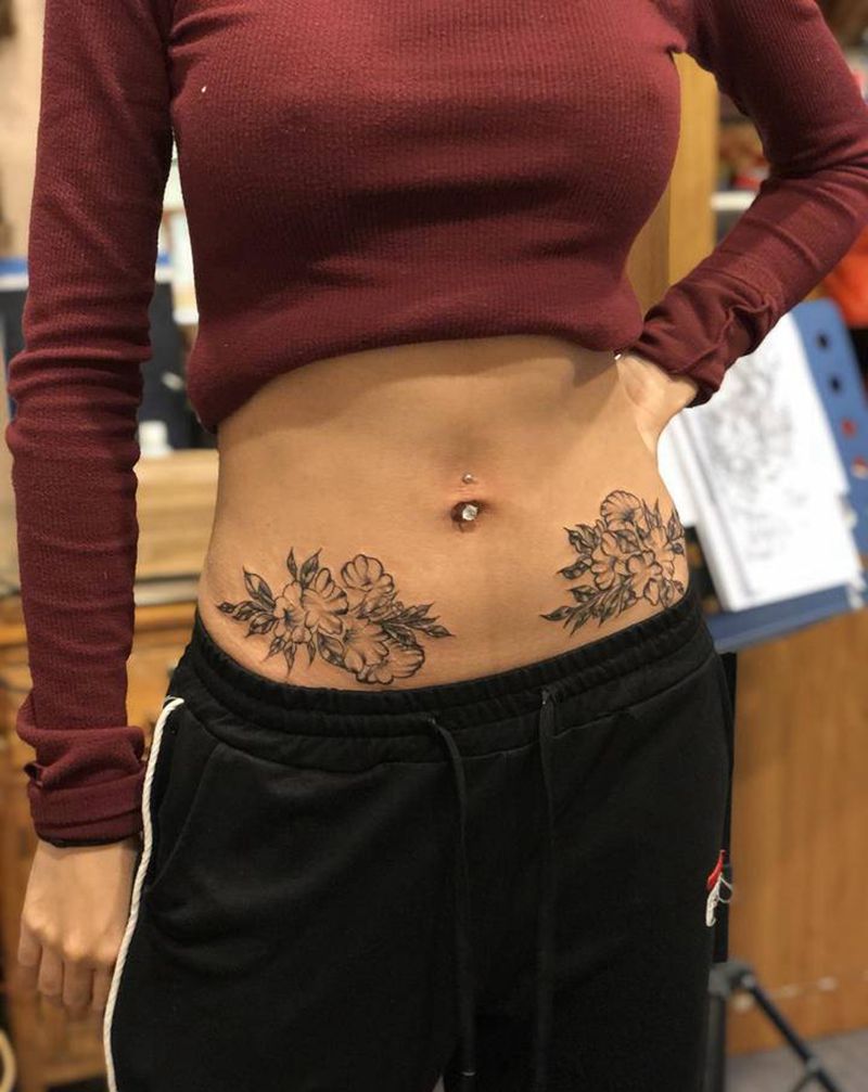 肚脐钉纹身图片_腹部点刺纹身图案