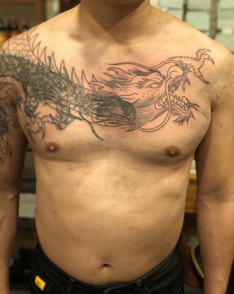 遮盖老式披肩龙纹身图片_肩部手臂新传统纹身图案