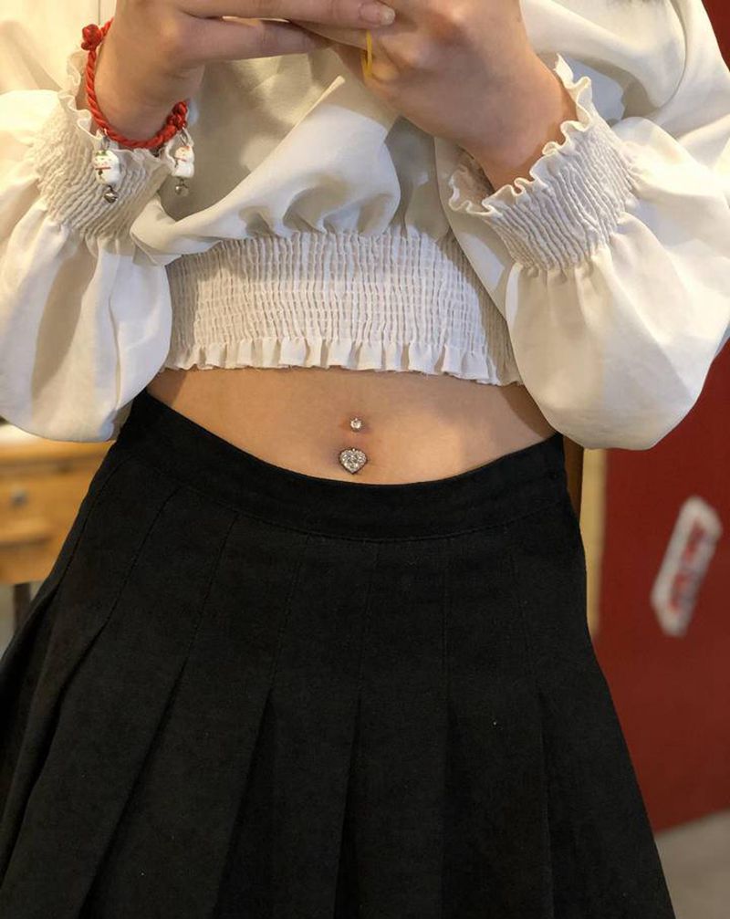 肚脐钉纹身图片_腹部Old School纹身图案