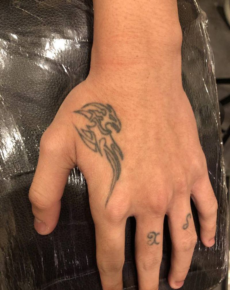 洗纹身纹身图片_手部老传统纹身图案