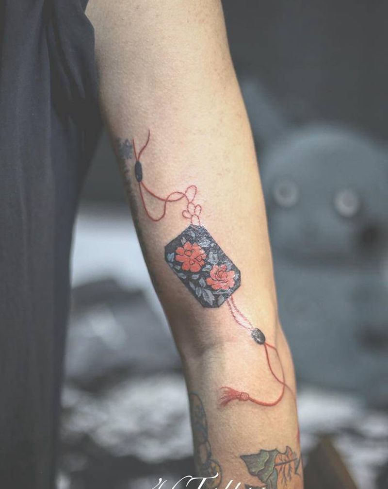 「香囊」纹身图片_手臂纹身图案