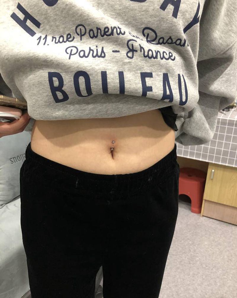 肚脐钉纹身图片_腹部几何纹身图案