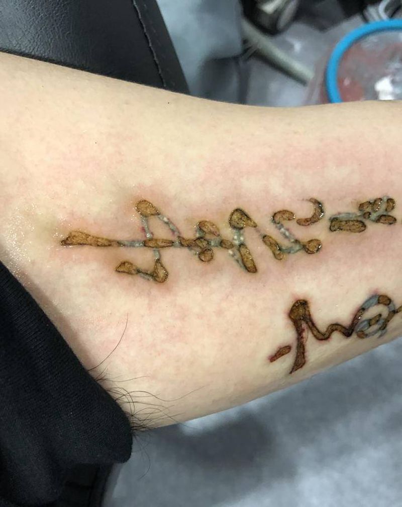 洗纹身纹身图片_手臂图腾纹身图案