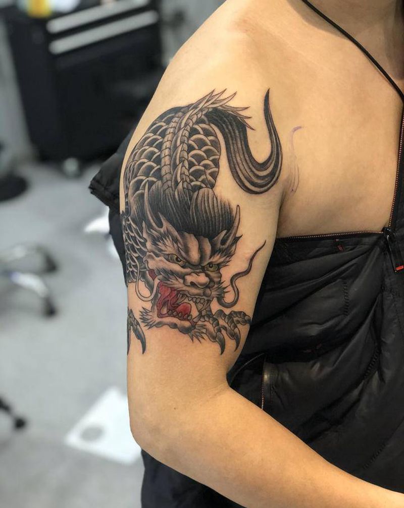 麒麟纹身纹身图片_手臂新传统纹身图案