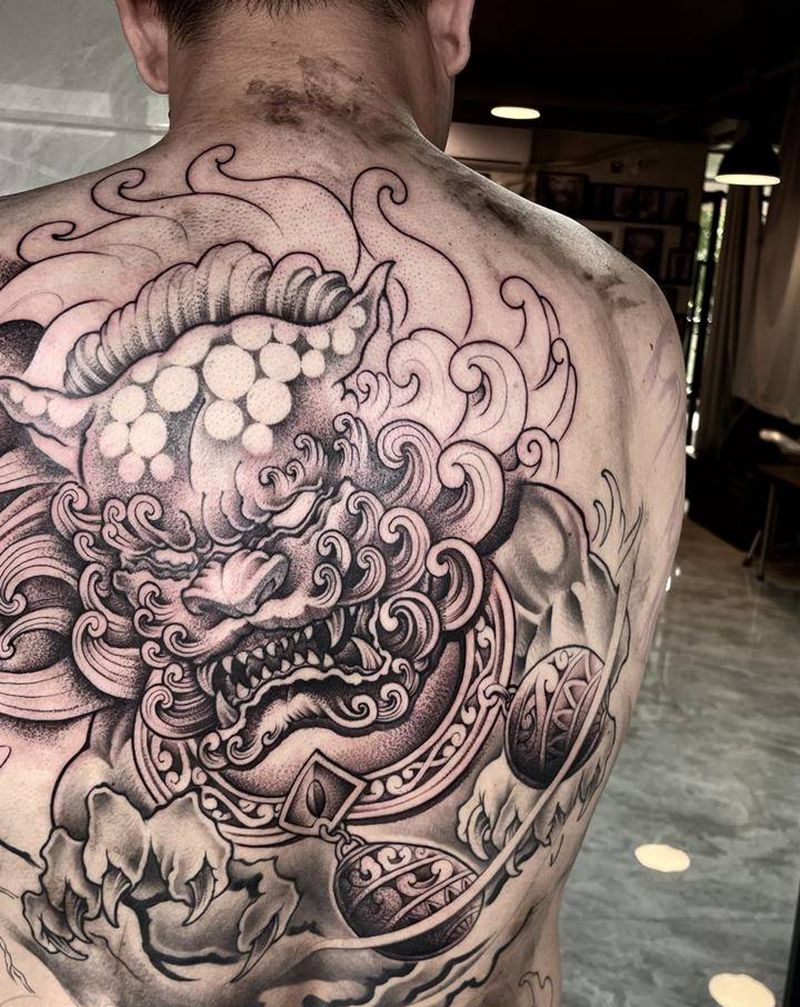 唐狮未完纹身图片_背部老传统新传统纹身图案