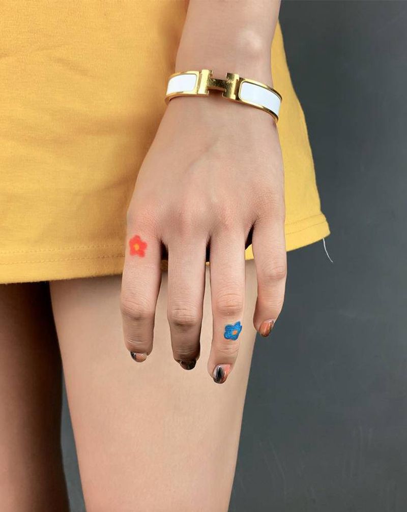 小发发纹身图片_手部手臂水墨水彩纹身图案