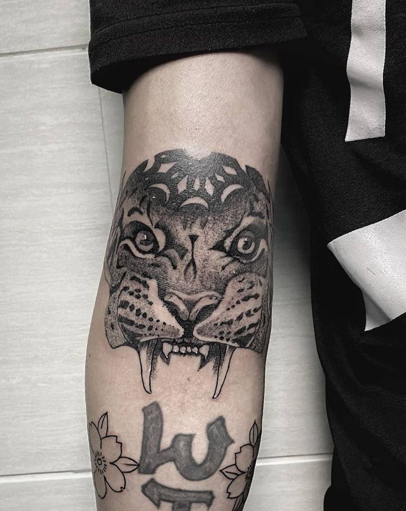 手臂虎作品纹身图片_手臂手部欧美写实新传统纹身图案