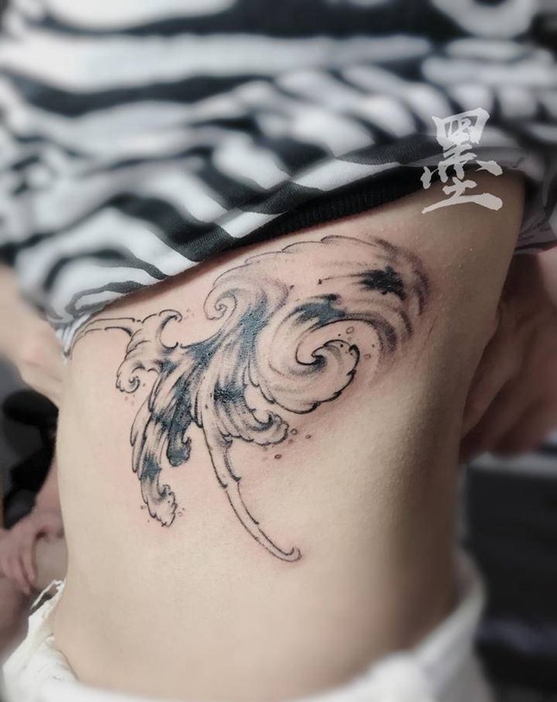 覆盖，客人需要水浪纹身图片_腰部纹身图案