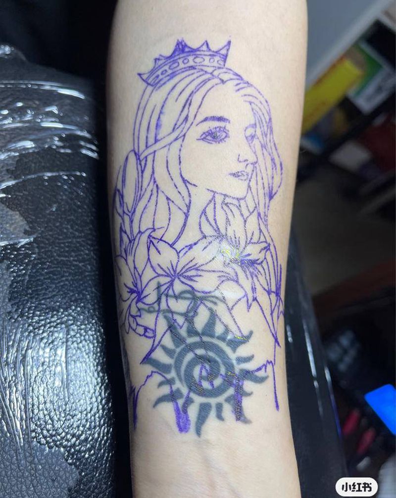 遮盖小太阳纹身图片_手臂纹身图案