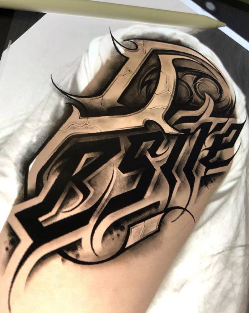 手稿纹身图片_肩部花体字纹身图案