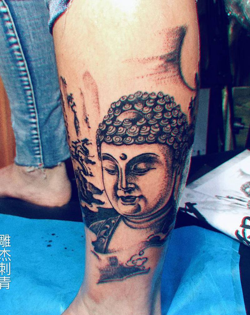 佛头纹身图片_腿部脚部老传统点刺佛头小腿点刺纹身图案
