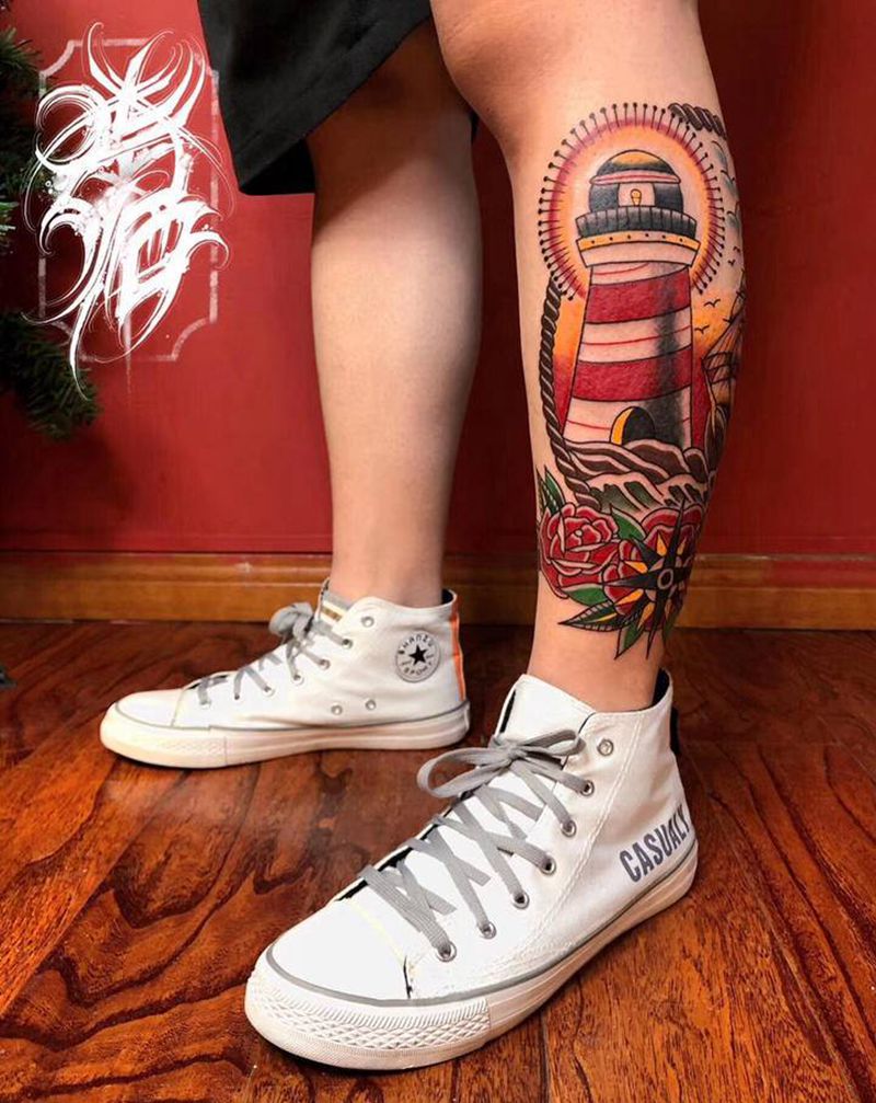 帆船灯塔指南针纹身图片_腿部Old School纹身图案