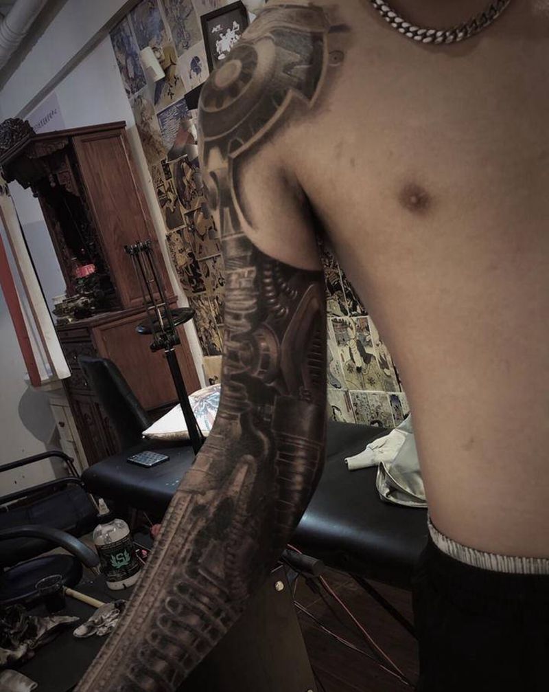 机械臂纹身图片_手臂纹身图案