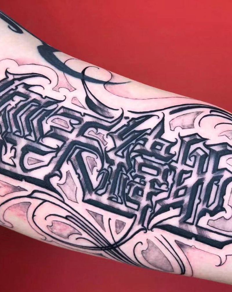 小臂内侧花体字纹身图片_手臂花体字纹身图案
