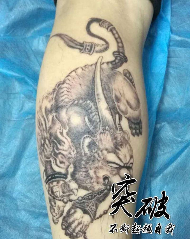 神兽纹身图片_腿部新传统纹身图案