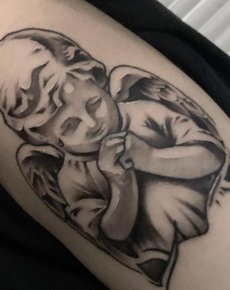 天使纹身图片_手臂欧美写实天使翅膀写实纹身图案