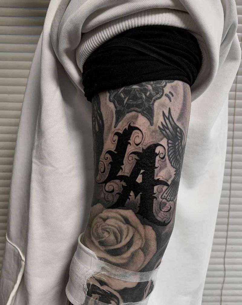 花体字纹身图片_手臂花体字LA纹身图案