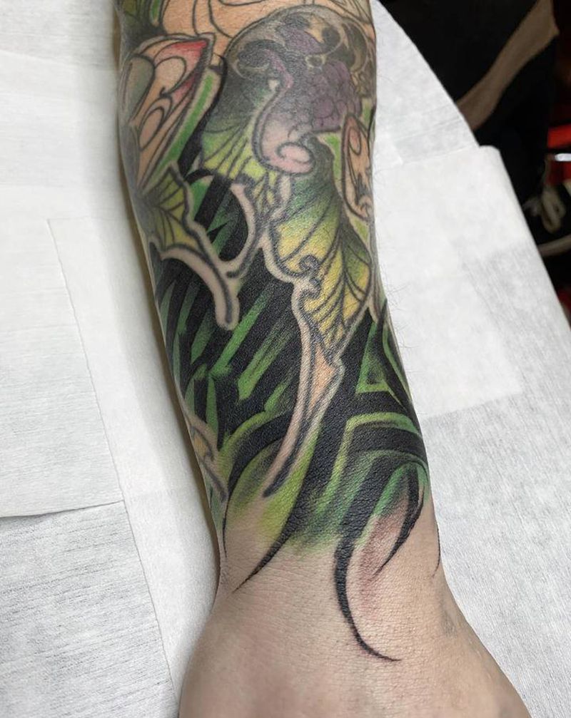 花体字纹身图片_手臂花体字纹身图案