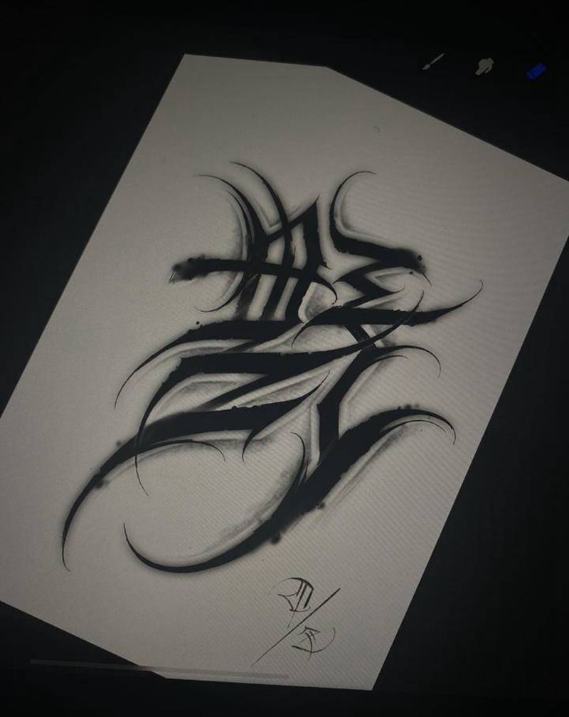 手稿纹身图片_肩部花体字纹身图案