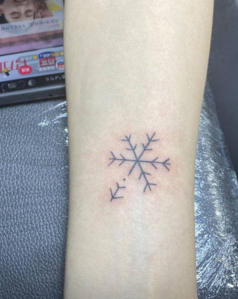 雪花纹身图片_手臂几何纹身图案