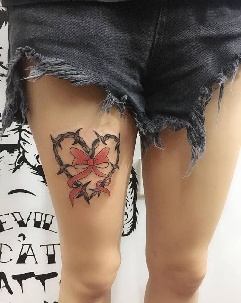 蝴蝶结纹身图片_腿部纹身图案