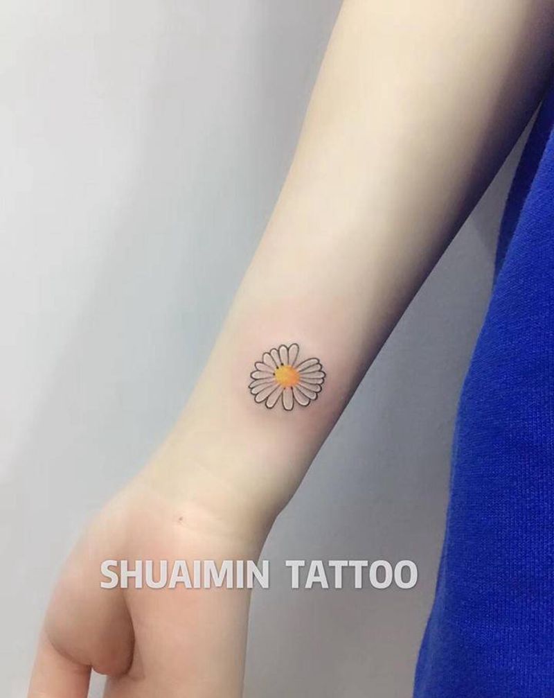 皱菊纹身图片_胸部手臂纹身图案