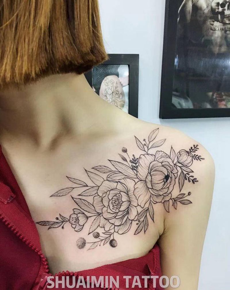 花纹身图片_胸部纹身图案