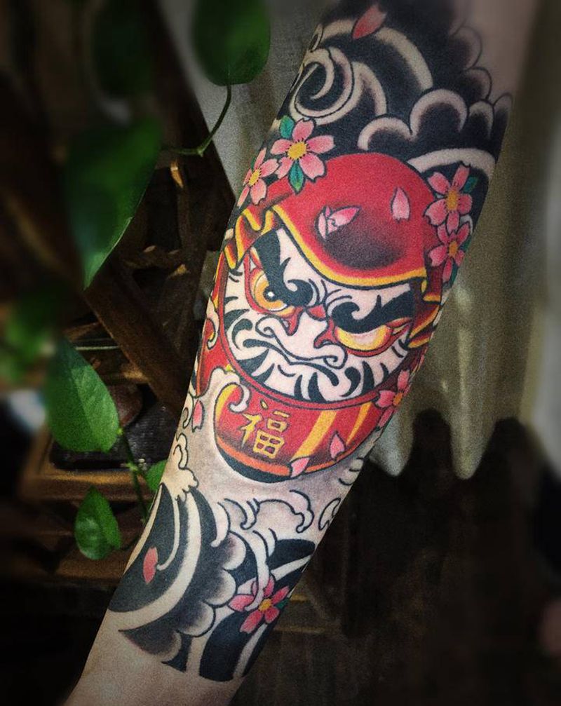 传统达摩蛋纹身图片_手臂纹身图案