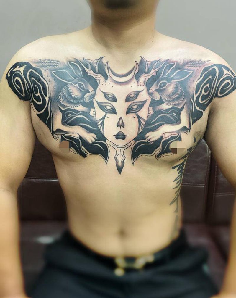 石姬月兔花胸纹身图片_胸部新传统纹身图案