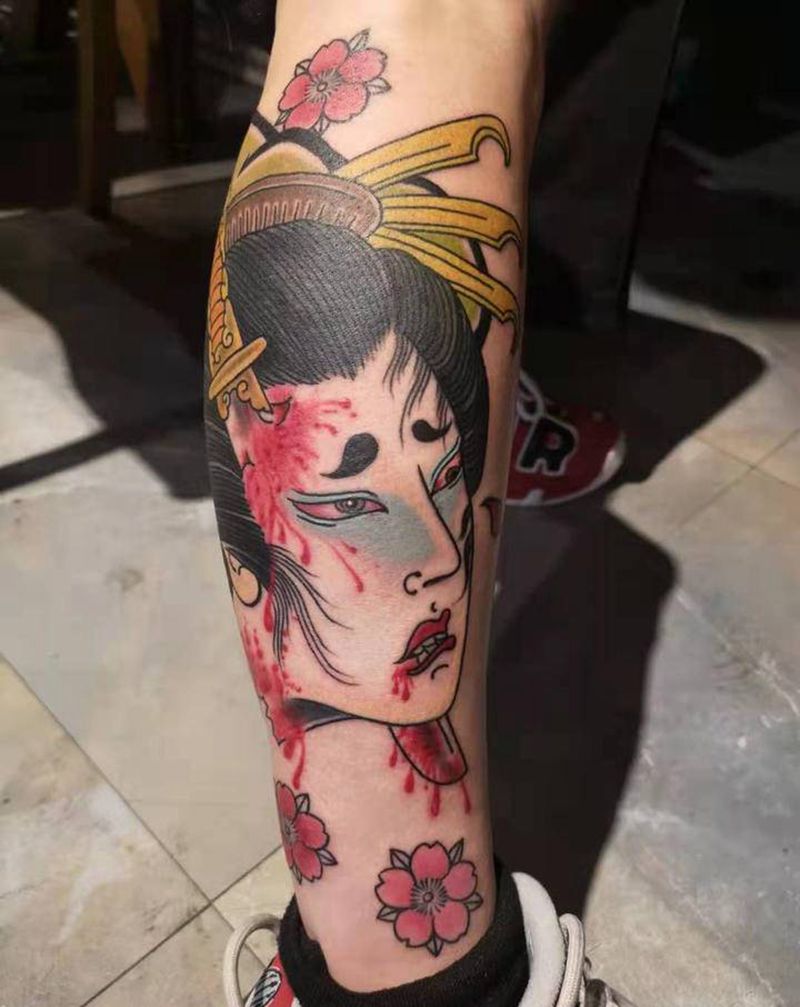 生首纹身图片_脚部老传统纹身图案