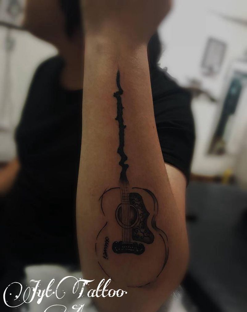 吉他纹身图片_手臂几何纹身图案