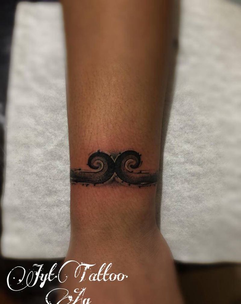 金箍咒纹身图片_手臂手部点刺纹身图案