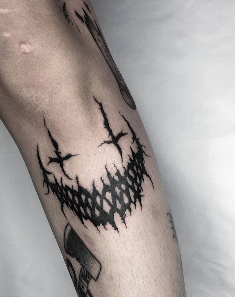 部分作品纹身图片_腿部笑脸纹身图案