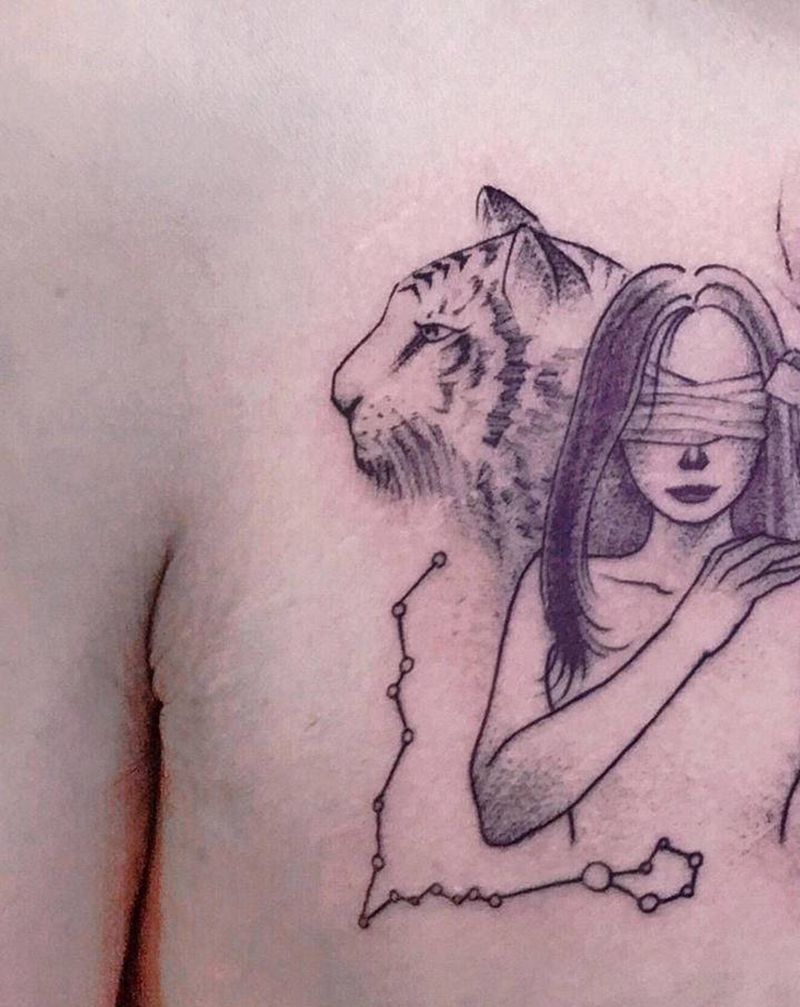 插队小图纹身图片_胸部水墨点刺纹身图案