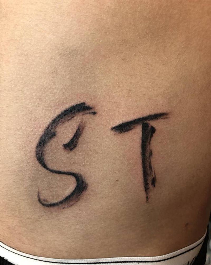 st纹身图片_腰部纹身图案