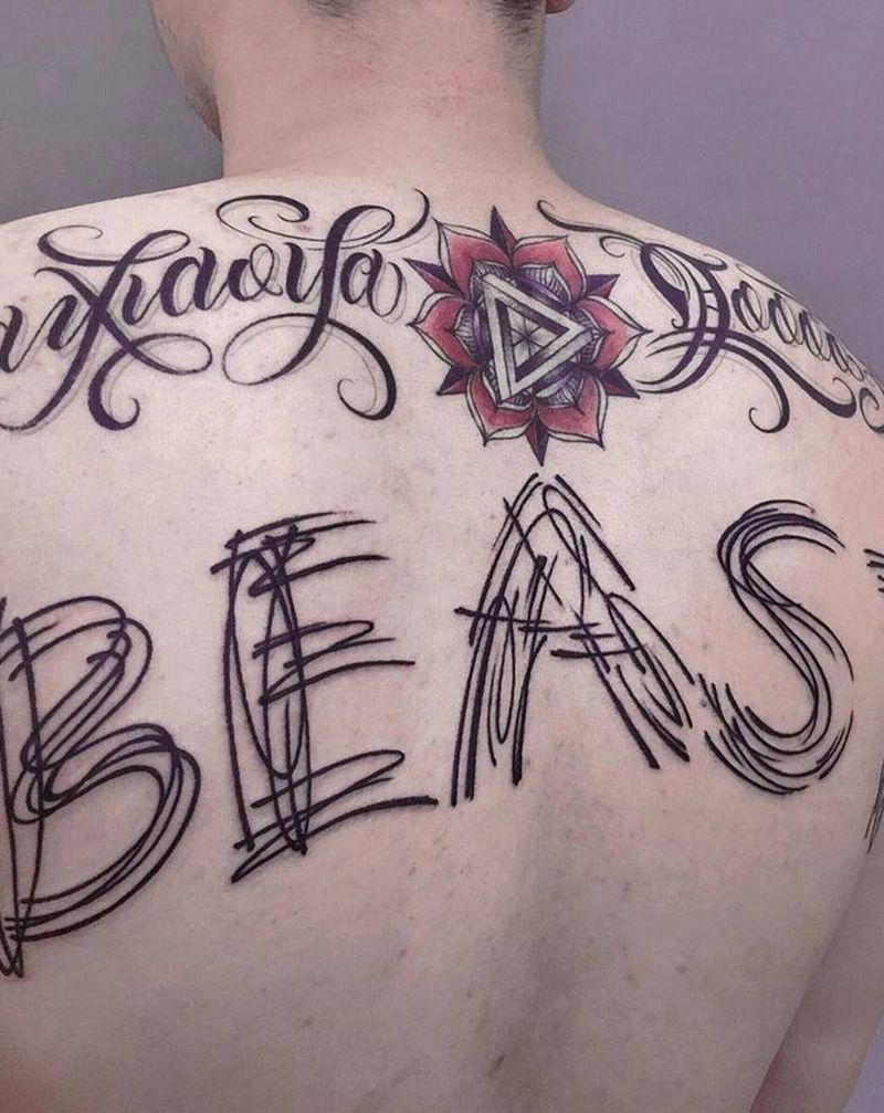 涂鸦纹身图片_背部纹身图案