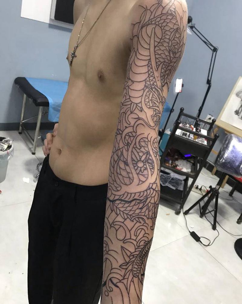龙花臂纹身图片_手臂腿部老传统纹身图案
