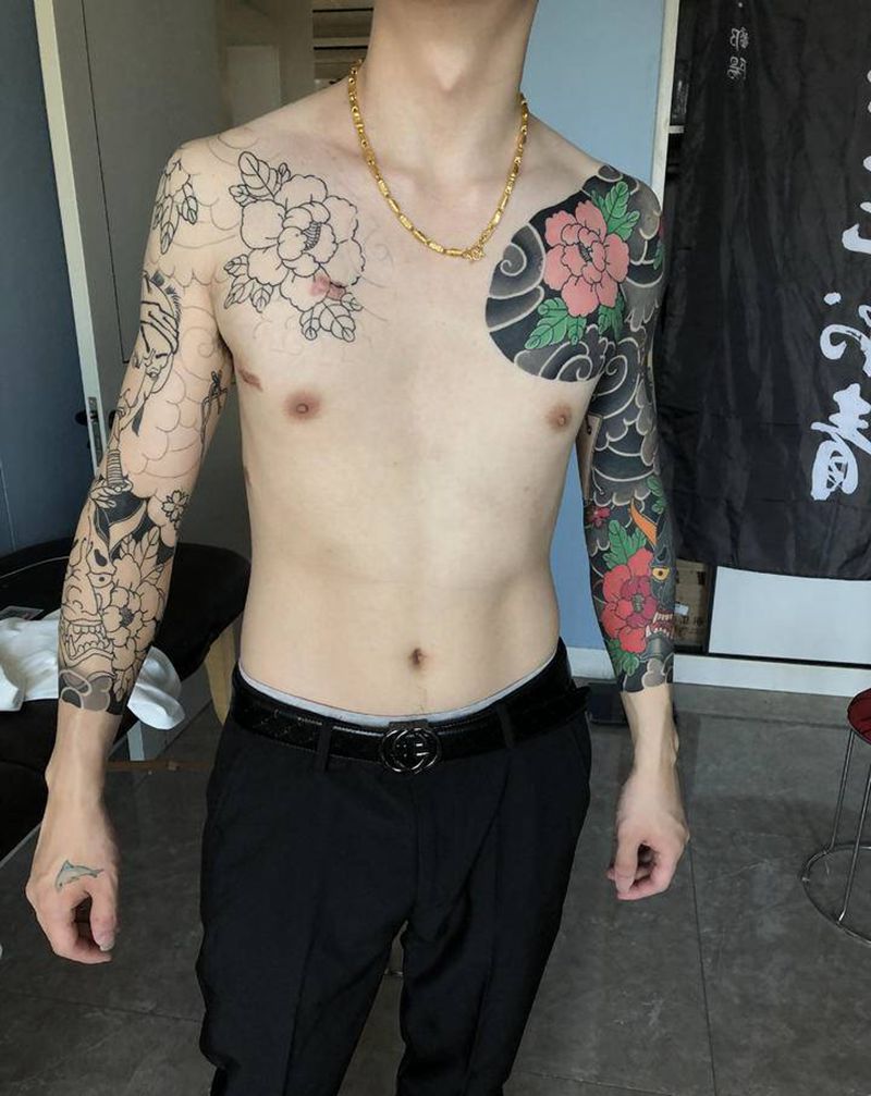 老传统花臂纹身图片_手臂老传统新传统生首牡丹纹身图案