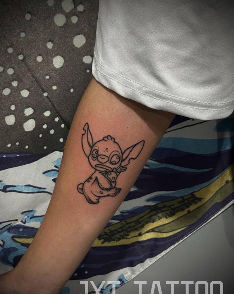 史迪仔纹身纹身图片_手臂New School史迪仔卡通纹身图案