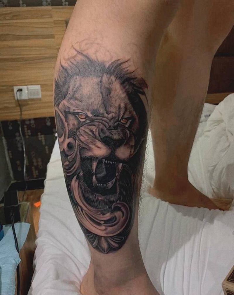 狮子纹身图片_腿部纹身图案