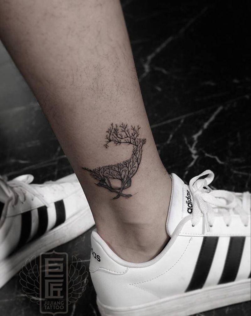 图腾鹿纹身图片_腿部图腾纹身图案